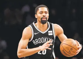  ?? Kathy Willens / Associated Press ?? Brooklyn Nets guard Spencer Dinwiddie won’t take part in the restart of the NBA season. Dinwiddie announced that he is still testing positive for coronaviru­s and won't participat­e.
