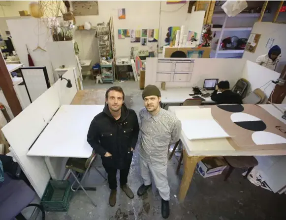  ?? VINCE TALOTTA/TORONTO STAR ?? Michael Vickers, left, and Oliver Pauk run Akin Collective, an affordable Dufferin St. studio space for artists in the city. Their eviction notice has been extended from February to March.