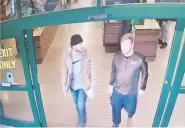  ??  ?? Patrik Mathews, left, and Brian Mark Lemley were seen on camera buying ammo on Jan. 1 at a store in Delaware.
