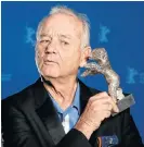  ?? /Reuters ?? Secrets: Bill Murray holds the Silver Bear for best director award in February on behalf of Wes Anderson for the movie Isle of Dogs.