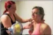  ?? MICHILEA PATTERSON — DIGITAL FIRST MEDIA ?? Massage therapist Erica Hansen O’Meara, on the left, uses a massage tool called the Fascia Blaster on her client Cheri Fox. Fascia is connective tissue in the body that can lead to pain if tightly bound.