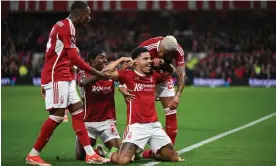  ?? ?? Morgan Gibbs-White celebrates scoring Nottingham Forest’s third goal against Fulham in first-half stoppage time. Photograph: Michael Regan/Getty Images