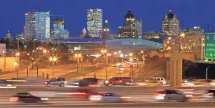  ?? MIKE DE SISTI/MILWAUKEE JOURNAL SENTINEL ?? The Milwaukee skyline is shown looking east along W. McKinley Ave. over I-43 toward the new arena on Nov. 29. See more photos and videos at jsonline.com/news.