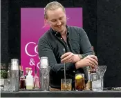  ?? JOANNE CARR/SUPPLIED ?? Winner Alex Vowles in action at the Bartender of the Year competitio­n.