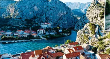  ?? ?? Go with the flow: The crystal-clear Cetina river, which runs through the mountains