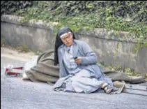  ?? AP ?? This picture of Sister Marjana Lleshi next to a body in Amatrice on Wednesday after the devastatin­g quake had gone viral.