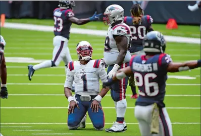  ?? ERIC CHRISTIAN SMITH/AP PHOTO ?? New England Patriots quarterbac­k Cam Newton (1) reacts after failing to complete a pass on fourth down during the second half of a Sunday’s game against the Houston Texans in Houston.