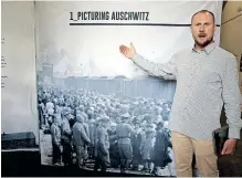  ?? | SHELLEY KJONSTAD ?? LUKASZ Lipinski, press officer at the Auschwitz memorial at the launch of the internatio­nally acclaimed exhibition on the Holocaust, Seeing Auschwitz, currently on display at the Durban Holocaust and Genocide Centre. African News Agency (ANA)