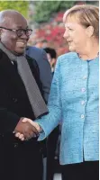  ?? FOTO: DPA ?? Kanzlerin Angela Merkel (CDU) und Nana Addo Dankwa Akufo-Addo, Präsident der Republik Ghana. Ghana zählt zu den Partnerlän­dern in dem Bündnis.
