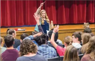  ?? WILLIAM HARVEY/THREE RIVERS EDITION ?? Kelsey Sumrall, a recent graduate of Harding University, instructs a drama class at Harding Academy in Searcy.