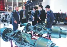  ??  ?? Left: Heavy duty axles displayed by Sinotruk at an auto show in Shanghai draw interest from foreign buyers.