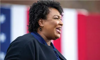  ??  ?? Stacey Abrams in Atlanta, Georgia on 15 December 2020. ‘What is so notable about this moment, and so disconcert­ing, is that they are not hiding,’ she said. Photograph: Alyssa Pointer/Atlanta Journal Constituti­on/EPA