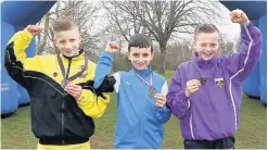  ??  ?? Medal winners Brodie Wright (Clydesdale), Cooper Mcholm (Hamilton) and Michael Mckinley (East Kilbride)