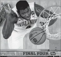  ?? AP PHOTO ?? Villanova forward Eric Paschall drives to the basket during the second half against Kansas in the semifinals of the Final Four NCAA basketball tournament Saturday in San Antonio.