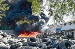  ??  ?? Plastic pipes burn at a godown in Bowenpally on Sunday. The pipes caught fire from garbage being burnt nearby. — DC