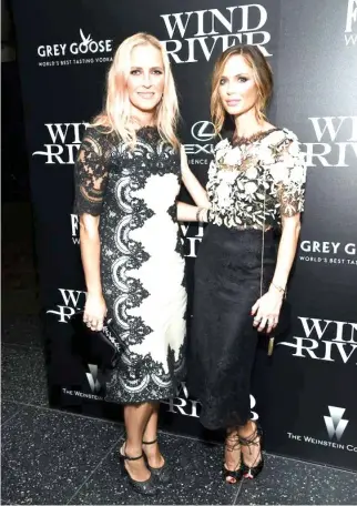  ??  ?? Fashion designers Keren Craig, left, and Georgina Chapman, co-founders of Marchesa, attend a special screening of ‘Wind River,’ in New York. (AP)
