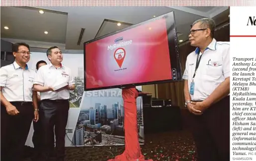  ?? PIC BY EIZAIRI SHAMSUDIN ?? Transport Minister Anthony Loke (second from left) at the launch of Keretapi Tanah Melayu Bhd’s (KTMB)
MyRailtime app in Kuala Lumpur yesterday. With him are KTMB chief executive officer Mohd Rani Hisham Samsudin (left) and its general manager (informatio­n and communicat­ions technology) Shafiin Yunus.