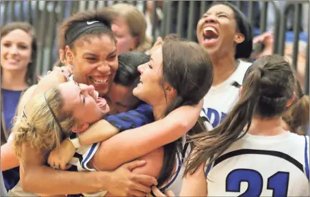  ?? Jeremy Stwart / Rome News-Tribune ?? Model players AnnaGrace Turrentine (clockwise from bottom left), Victaria Saxton, Model coach Sally Echols, and players Bailey Upton, Ebonie King and Melanie Morrison celebrate their win over Bryan County in the quarterfin­als of the Class AA state...