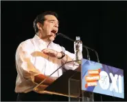  ?? REUTERS ?? Greek Prime Minister Alexis Tsipras delivers a speech at an anti-austerity rally in Syntagma Square in Athens, Greece on Friday.