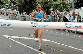  ??  ?? Round the Bays 2018 first woman across the line Olivia Burne.