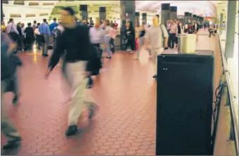  ?? Lawrence Livermore National Laboratory ?? A BIOWATCH air sampler in the Washington, D.C., subway. This unit is a prototype of next-generation samplers intended to be more reliable, but the new technology has also shown problems in testing.