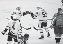  ?? Associated Press photo ?? Pittsburgh Penguins centre Jake Guentzel (59) celebrates his goal with centre Sidney Crosby (87) and defenceman Justin Schultz (4) during the third period in Game 1 of an NHL second-round hockey playoff series as Washington Capitals right wing T.J....