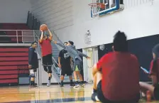  ?? Photos by Joe Amon, The Denver Post ?? Youngsters playing ball at the Ute Mountain Recreation Center in Towaoc in June.