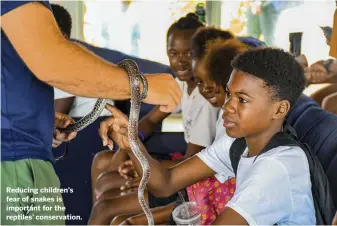  ??  ?? Reducing children’s fear of snakes is important for the reptiles’ conservati­on.