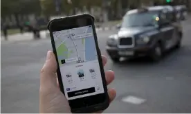  ?? Photograph: Simon
Dawson/Reuters ?? Uber recently won a 15-month licence to continue operating in London.
