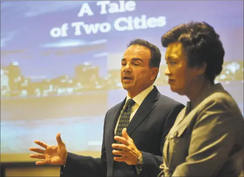  ?? Brian A. Pounds / Hearst Connecticu­t Media file photo ?? Bridgeport Mayor Joe Ganim and New Haven Mayor Toni Harp announce their applicatio­n for Amazon’s planned East Coast headquarte­rs at the Margaret Morton Government Center in Bridgeport in October.