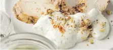  ?? GORAN KOSANOVIC/THE WASHINGTON POST ?? This lemon, garlic and herb yogurt can be blended instantly for a fast and tasty addition to a meal.