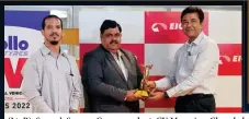  ?? ?? (LtoR): Sumesh Soman, Correspond­ent, CV Magazine, Chanchal Arora, Deputy GM North, Next Gen Publishing Pvt. Ltd. handing over the trophy to Vishal Mathur, Senior VP - LMD, Eicher Trucks and Buses.