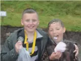  ??  ?? If all else fails, eat some candy floss and smile about your medal. 29_t29 morvern 14