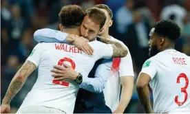  ?? Photograph: TF-Images/ Getty Images ?? Gareth Southgate and Kyle Walker embrace after the World Cup semi-final defeat to Croatia. The full-back won his 50th England cap against Belgium.