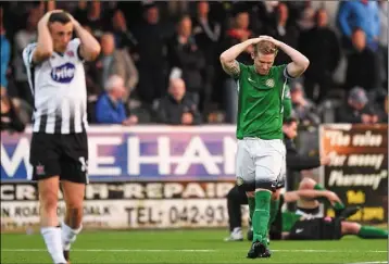  ??  ?? Dylan Connolly and Conor Kenna react following an injury to Kenna’s teammate Andrew McGovern.