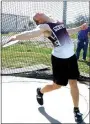  ?? Westside Eagle Observer/RANDY MOLL ?? Mason Clark of Gentry throws the discus during the Pioneer Relays in Gentry on April 12.