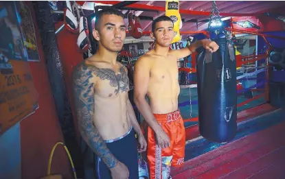  ?? ADOLPHE PIERRE-LOUIS/JOURNAL ?? Boxers Jason Sanchez, left, and his brother José Luís Sanchez were both hit hard by the death of their older brother, Alan.