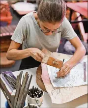  ?? CONTRIBUTE­D BY VACATION WITH AN ARTIST ?? Vacation with an Artist helps individual­s or small groups book mini apprentice­ships with craftspeop­le like a Malaysian leather puppet carver.
