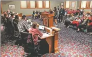  ?? NWA Democrat-Gazette/ANDY SHUPE ?? Members of the staffs of the Har-Ber Herald, the student newspaper at Har-Ber High School, and the school’s yearbook, speak Tuesday to the Springdale School Board during a public comment portion of the board’s meeting in Springdale.