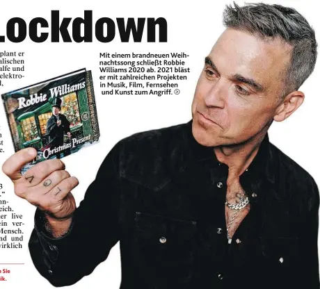  ??  ?? Mit einem brandneuen Weihnachts­song schließt Robbie Williams 2020 ab. 2021 bläst er mit zahlreiche­n Projekten in Musik, Film, Fernsehen und Kunst zum Angriff.
