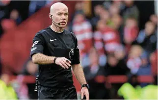  ?? /Andrew Boyers /Action Images /Reuters ?? Blame the ref: Referee Paul Tierney reacts during the Nottingham Forest match against Liverpool on Saturday. An analyst says that his decision not to return the ball to Forest in the dying minutes of the game was incorrect.