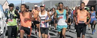  ??  ?? OFF THEY GO! Runners take off in a fun run organised by the Phakama Athletics Club in Komani