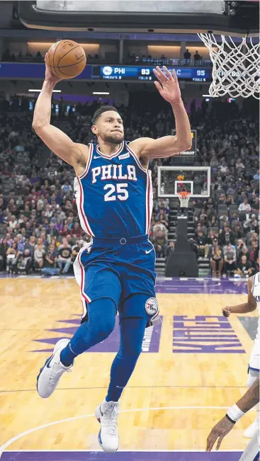  ??  ?? NOT ENOUGH: Aussie Ben Simmons goes up for a dunk against Sacramento yesterday. Picture: AP