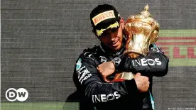  ??  ?? Lewis Hamilton celebrates winning his eight home Grand Prix at Silverston­e.