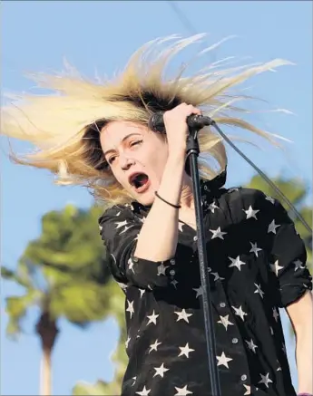  ?? Katie Falkenberg Los Angeles Times ?? ALISON MOSSHART of the Kills performs at Coachella in April. “Ash & Ice” is the act’s first new album since 2011. “We wanted to do what we’re totally uncomforta­ble with,” she says of the new work.