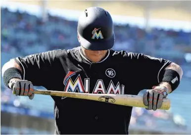  ?? JAYNE KAMIN-ONCEA/GETTY IMAGES ?? The Marlins front office, coaches and players, like A.J. Ellis above, are frustrated by this bad stretch the team is suffering through.