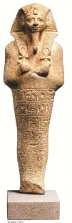  ?? ALAMY / ACI ?? USHEBTI DE AMENHOTEP
Esta figurita funeraria lleva inscritos los nombres de Amenhotep II. La figura porta dos símbolos ankh y va tocada con el nemes real rematado con un ureo o cobra.