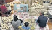  ?? ANI ?? Tax officials during the raid at businessma­n Piyush Jain's residence, in Kanpur on Friday.