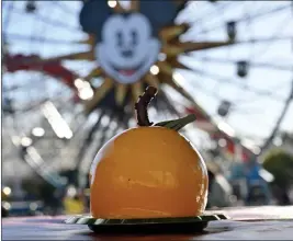  ?? PHOTOS BY JEFF GRITCHEN — STAFF PHOTOGRAPH­ER ?? Mandarin orange mousse cake is among the desserts returning to the food lineup for Disney California Adventure’s Lunar New Year festival. The event through Feb. 18will also offer a number of new sweet and savory foods and beverages.