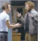  ?? UNIVERSAL PICTURES ?? Michael Fassbender, left, as Steve Jobs, hears often from his “conscience,” Seth Rogen as SteveWozni­ak in “Steve Jobs."